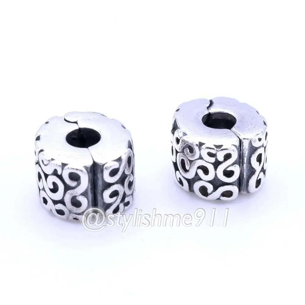 Two Authentic PANDORA Silver Swirls Clips Charms - 790338